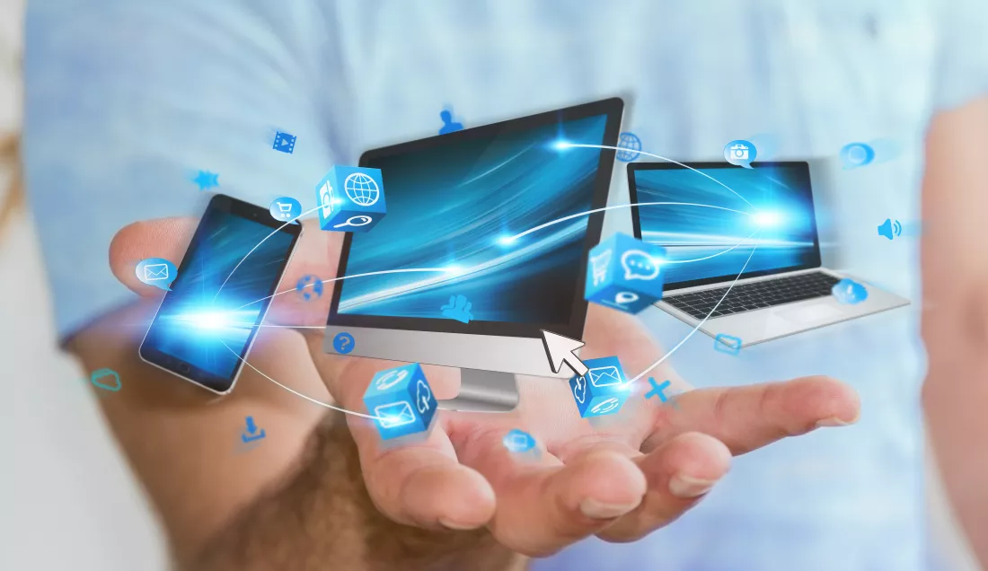 businessman-holding-tech-devices-his-hand